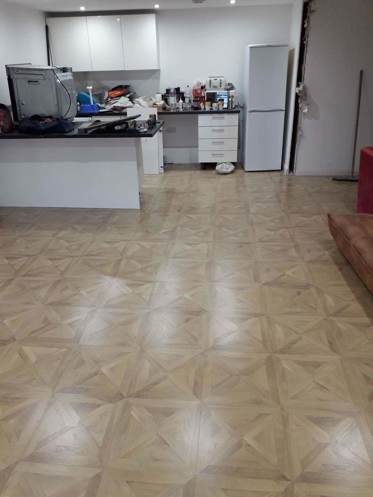 Parquet-style flooring laid in a kitchen in Essex