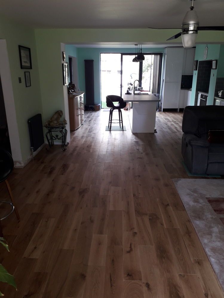 Real wood flooring laid in an open-plan Essex home by Holmes Interior Flooring
